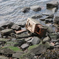 Discarded Payphone. East River. August 11, 2003.