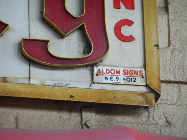 NEvins 9-4012. Aldom Signs. Seen in Woodside, Queens.