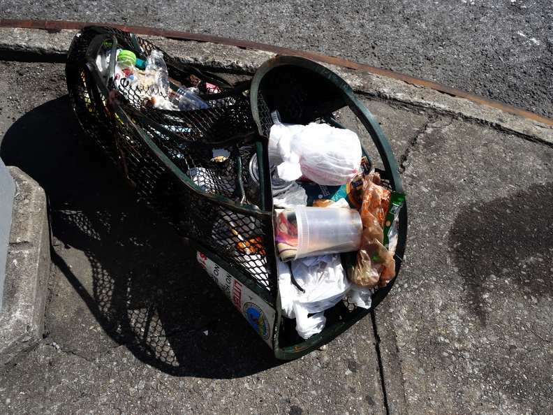 Warped Garbage Can. Flushing, Queens. August, 2016.