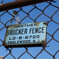 Another Brucker Fence. LOwell-8-6700.