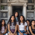 Teenage-girls-living-inside-family-mausoleums-at-Old-Calvary-Cemetery-in-Queens,-New-York.