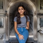 Teenage-girl-living-inside-a-family-mausoleum-at-Old-Calvary-Cemetery-in-Queens,-New-York.-Her-mausoleum-niche-is-actually-an-oven.