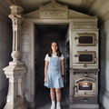 Teenage-girl-living-inside-a-family-mausoleum-at-Old-Calvary-Cemetery-in-Queens,-New-York.-Her-mausoleum-niche-is-actually-an-oven. (3)