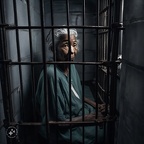 photojournalism-quality-photo-of-an-elderly-woman-living-inside-her-solitary-confinement-cell-at-the-St.-Michael's-cemetery-mausoleum-in-which-she-was-born-and-raised-and-spent-her-entire-life-in-a-solitary-confinement-cell-w