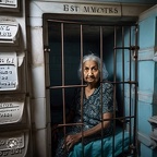 photojournalism-quality-photo-of-an-elderly-woman-living-inside-her-solitary-confinement-cell-at-the-St.-Michael's-cemetery-mausoleum-in-which-she-was-born-and-raised-and-spent-her-entire-life-in-a-solitary-confinement-ce (2)