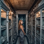 photojournalism-quality-photo-of-a-youthful-40-something-woman-living-inside-her-family's-community-mausoleum-crypt-at-the-St.-Michael's-cemetery-in-Astoria,-Queens,-where-she-was-born-and-raised-and-spent-her-entire-life (1)