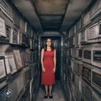 photojournalism-quality-photo-of-a-youthful-40-something-woman-living-inside-her-family's-community-mausoleum-crypt-at-the-St.-Michael's-cemetery-in-Astoria,-Queens,-where-she-was-born-and-raised-and-spent-her-entire-life (2)