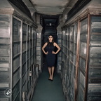 photojournalism-quality-photo-of-a-youthful-40-something-woman-living-inside-her-family's-community-mausoleum-crypt-at-the-St.-Michael's-cemetery-in-Astoria,-Queens,-where-she-was-born-and-raised-and-spent-her-entire-life (3)