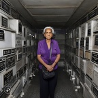 photojournalism-quality-photo-of-a-nondescript-woman-living-inside-her-family's-community-mausoleum-crypt-at-the-St.-Michael's-cemetery-in-Astoria,-Queens,-where-she-was-born-and-raised-and-spent-her-entire-life-in-a-soli (3)