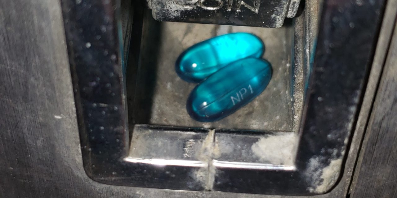 Two pills in the payphone